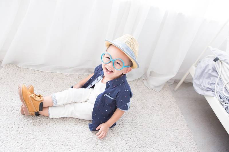 Stylish child wearing glasses