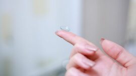 contact lens on a finger tip
