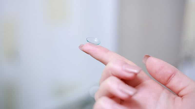 contact lens on a finger tip