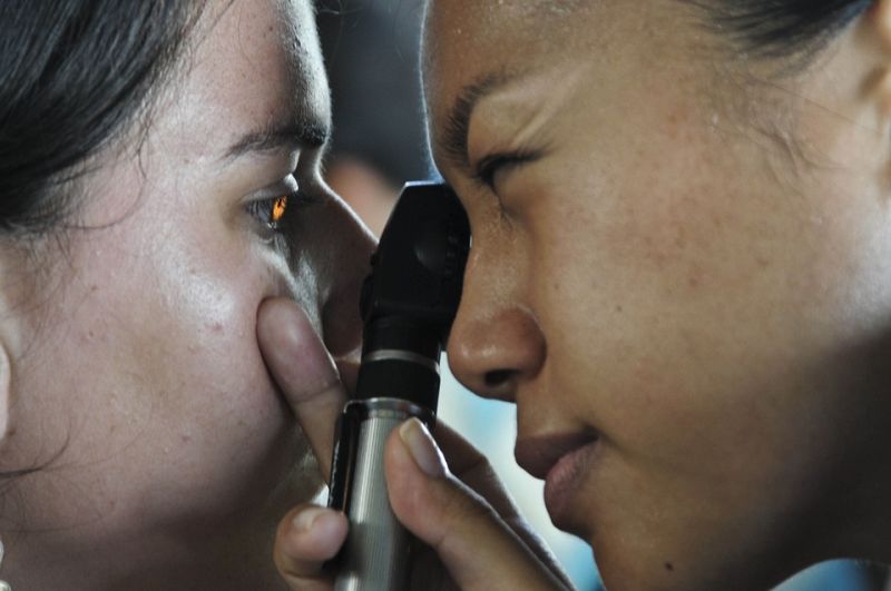 Woman having her eyes examined