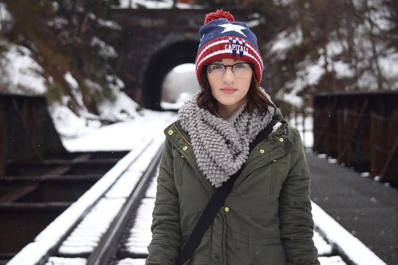 Woman on train tracks